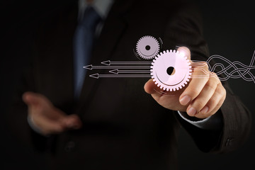 Poster - Businessman hand pressing an imaginary button on virtual screen