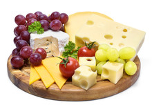 Delicious Cheese Plate With Various Sorts Of Cheese Like Emmentaler, Gouda And Brie. Gourmet Cheese On A Wooden Cutting Board, Isolated On White Background.