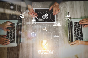 Aufkleber - Team business meeting presentation. Hand businessman working new start up project in modern office.Laptop computer and digital table and smart phone on wood table. Top view, Sun flare effect photo
