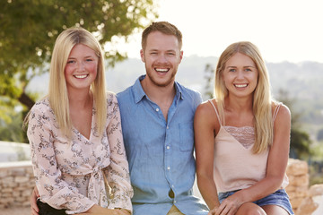 Wall Mural - Portrait Of Young Friends Having Fun On Holiday Together