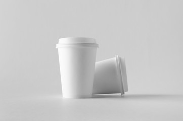 Poster - 12 oz. white coffee paper cup mock-up with lid.