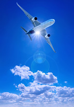 Airplane Against A Blue Sky