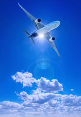 airplane against a blue sky
