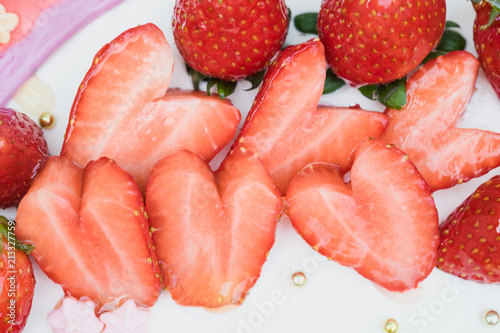 Fresh Slice Strawberry Fruit Heart Shape Decoration On Vanilla