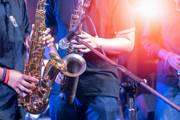 International jazz day and World Jazz festival. Saxophone, music instrument played by saxophonist player musician in fest.