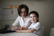 © natalialeb - happy beauty mother engaged with son,real interior