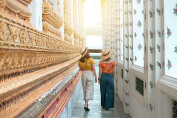 Wall Mural - Tourist is visiting and sightseeing inside the Wat Arun temple in Bangkok, Thailand during holiday summer vacation time.