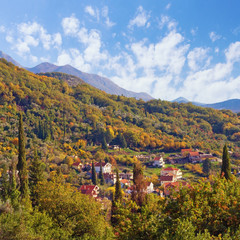 Colorful autumn landscape.  Montenegro, view of the suburb of Tivat city from the slope of the mountain