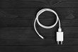 canvas print picture - Cable phone chargers on wood background