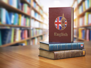 Poster - Learn English concept. English dictionary book or textbok with flag of Great Britain and Big ben tower on the cove in the library.