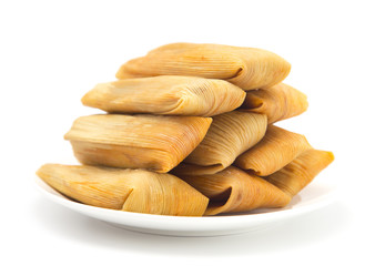 Homemade Wrapped Tamales Isolated on a White Background