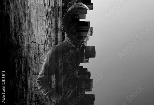 Cuadros en Lienzo Suspicious man in hoody. Personal safety concept