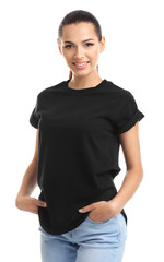 Wall Mural - Young woman in t-shirt on white background. Mockup for design