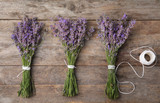 Fototapeta Lawenda - Flat lay composition with lavender flowers on wooden background