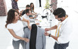 © ASDF - designers working on new models of clothes