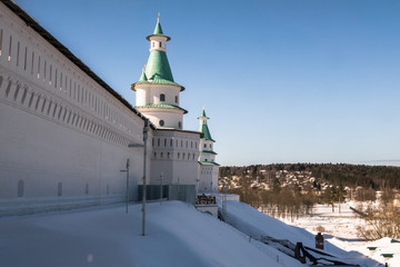 The fortress walls with towers around the New Jerusalem Monastery of the 17th century. Istra, Moscow suburbs, Russia.