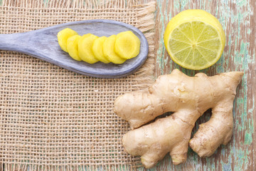 Wall Mural - ginger and lemon on the table seen from above