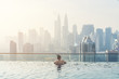 © chokniti - Swimming pool on roof top with beautiful city view kuala lumpur malaysia