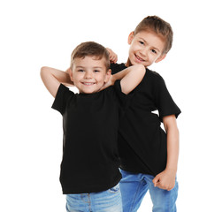 Wall Mural - Little kids in t-shirts on white background. Mockup for design