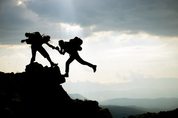 leading climbers;Team work, life goals and self improvement concept