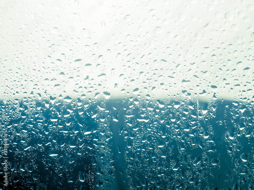 Glass Raning Water drop on the glass of windows background, raining on the glass off ...