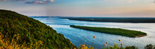Panoramic View On Volga River And Island With Green Forest During Summer Sunset From Hill Near Samara City