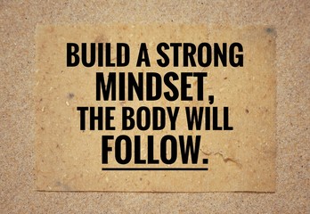 Wall Mural - Motivational and inspirational quote - Build a strong mindset, the body will follow. Vintage styled background.
