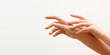© looking2thesky - Beautiful Woman Hands. Female Hands Applying Cream, Lotion. Spa and Manicure concept. Female hands with french manicure. Soft skin, skincare concept. Hand Skin Care.