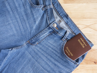 Passport in blue jean pocket 2