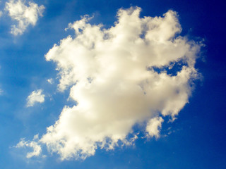 blue sky with fluffy clouds