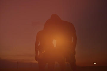 Couple Man and Woman Hugging in Love,silhouette of romantic lover.