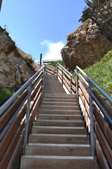 Wall Mural - View looking up at wooden staircase