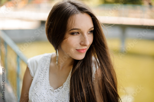 Beautiful Girl With Dark Hair In Elegant White Dress Buy This