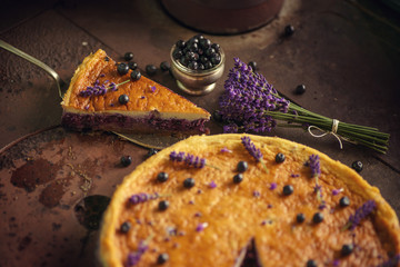 Wall Mural - blueberries and lavander cheesecake served on oven with berries and flowers, still life for patisserie, healthy cake