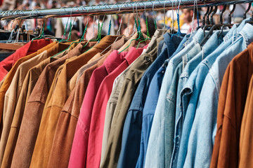 jackets and shirts on vintage clothing market / second hand fashion flea market
