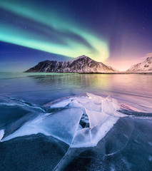 Wall Mural - northen light on the arctic beach. beautiful natural landscape in the norway