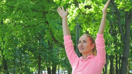Wall Mural - fitness woman stretching her muscles before training, ready for jogging in summer park