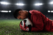 © fotokitas - Soccer goalkeeper catches the ball