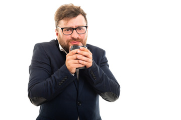 Wall Mural - Portrait of business man warming with to go cup of coffee.