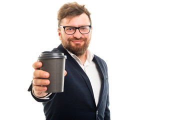 Wall Mural - Portrait of business man handing a to go cup of coffee.