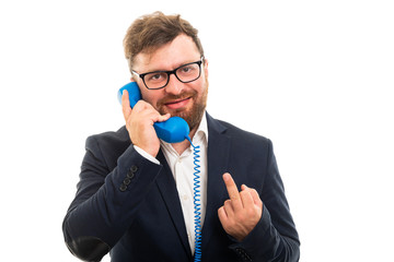 Wall Mural - Business man talking on blue receiver and showing middle finger.