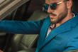 © Viorel Sima - attractive smart casual man with sunglasses driving his car