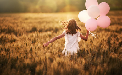 Wall Mural - Girl running on cereal field