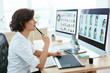 © puhhha - Web Designer Working On Computer