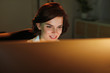 © puhhha - Female Programmer Writing Software On Computer
