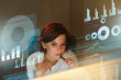 © puhhha - Female Programmer Working With Hologram Display