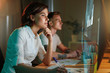 © puhhha - Programmers Writing Software For Website On Holographic Screen