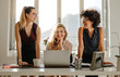 © Jacob Lund - Group of three diverse women in office