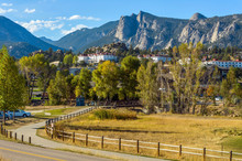 Estes Park - An Autumn Afternoon At Downtown Estes Park, With The Stanley Hotel And Rocky Mountains In Background. Colorado, USA.