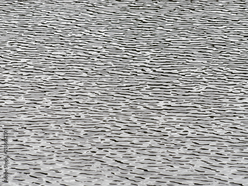 Fényképezés Ornamentale Wellen auf einem finnischen See